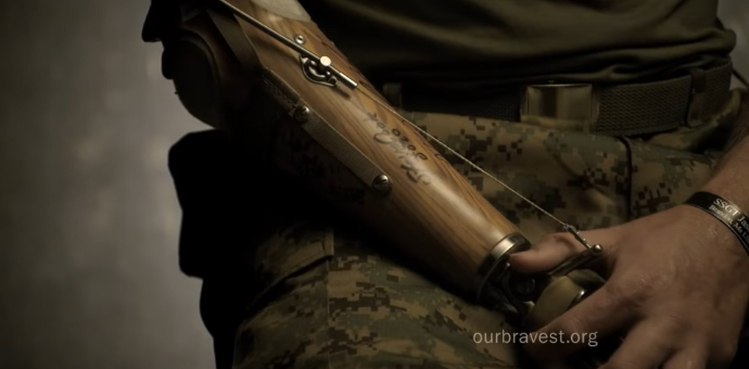 young service member with an artificial arm